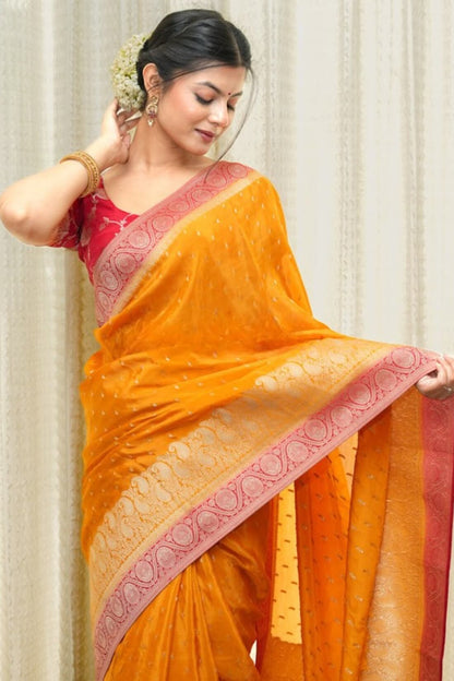 Lustrous Orange Soft Silk Saree With Elaborate Blouse Piece