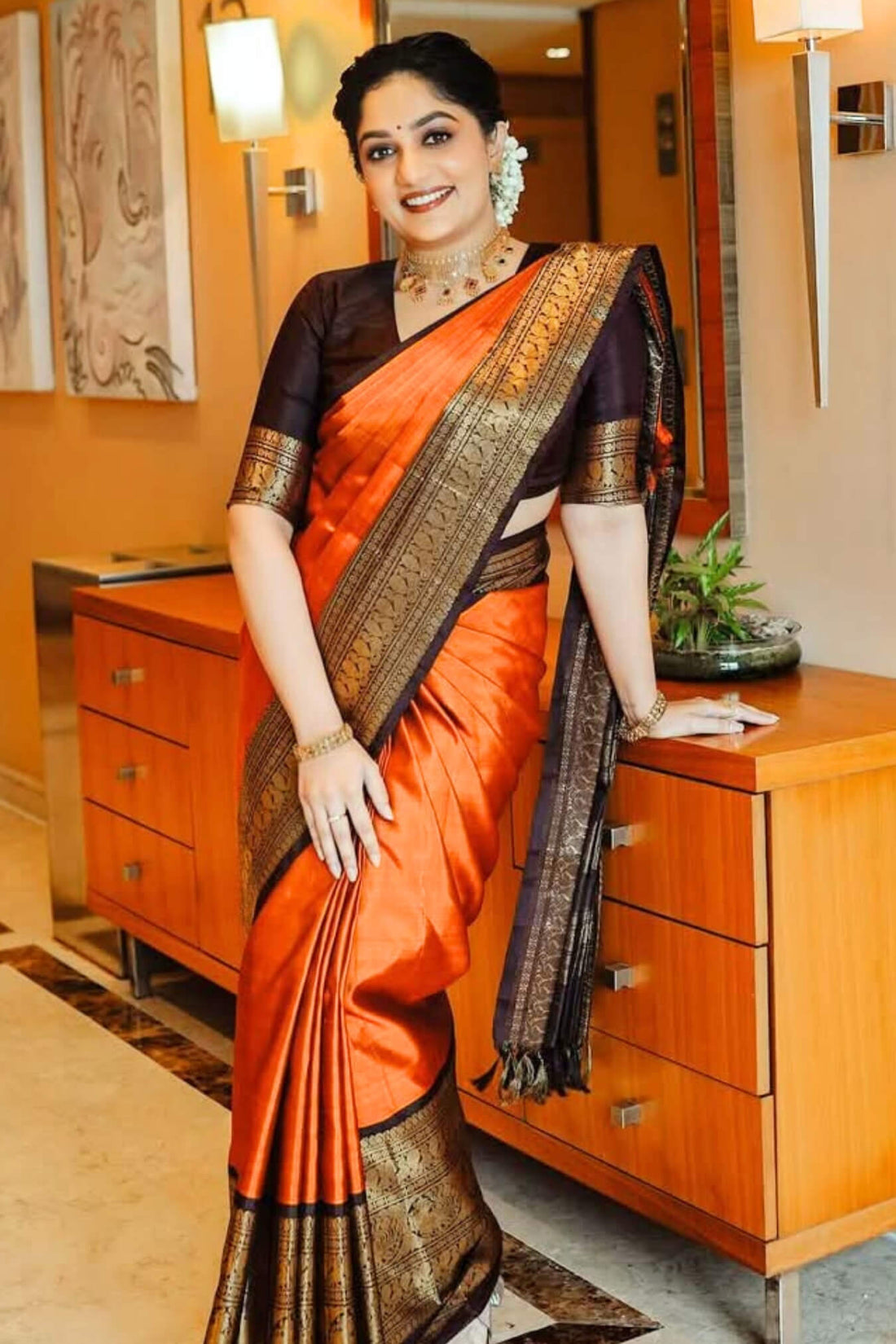 Breathtaking Orange Soft Silk Saree With Captivating Blouse Piece