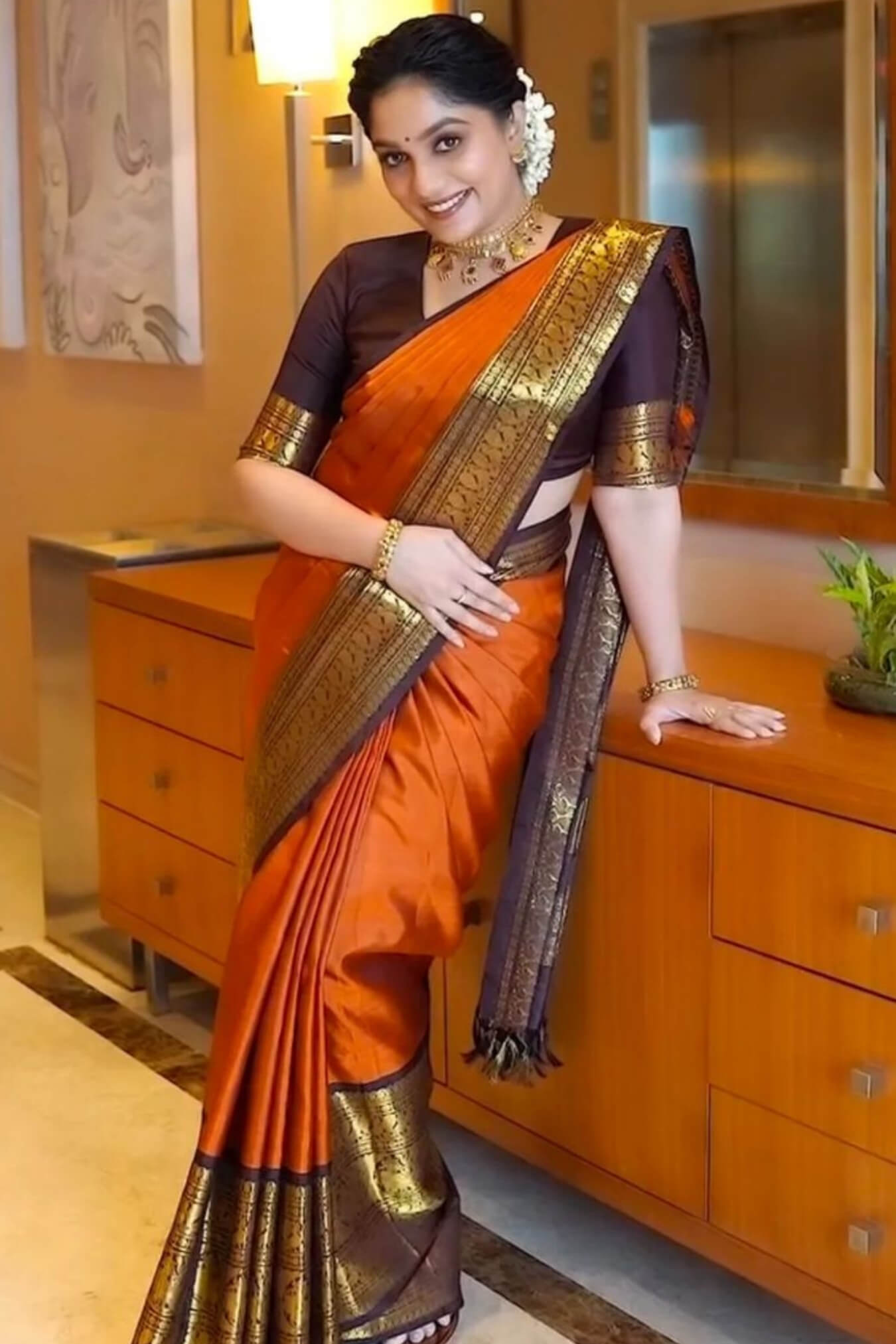 Breathtaking Orange Soft Silk Saree With Captivating Blouse Piece