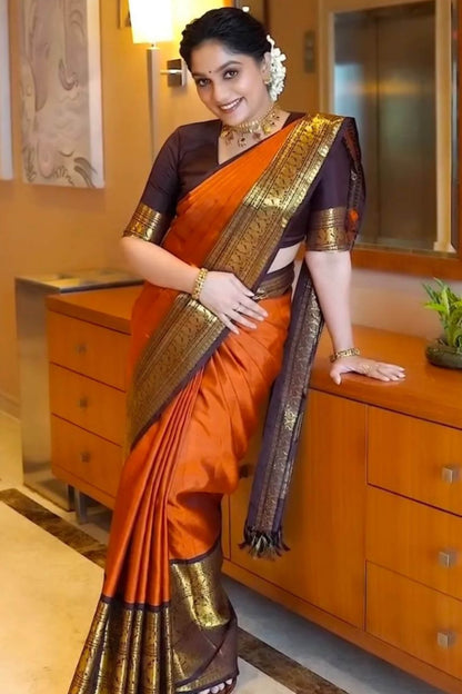 Breathtaking Orange Soft Silk Saree With Captivating Blouse Piece