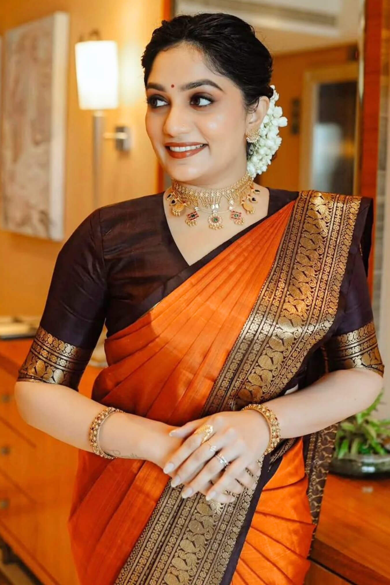 Breathtaking Orange Soft Silk Saree With Captivating Blouse Piece