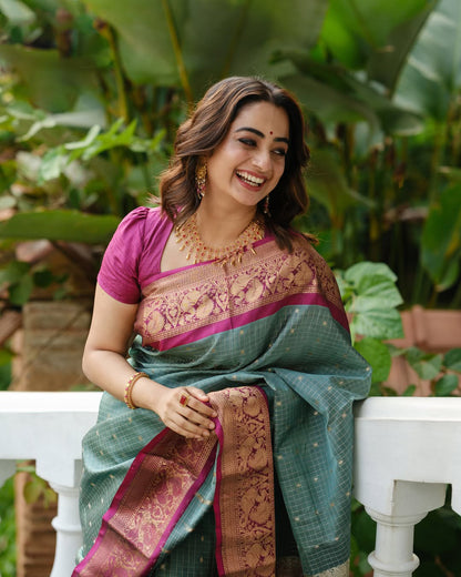 Dissemble Sea Green Soft Silk Saree With Pleasant Blouse Piece
