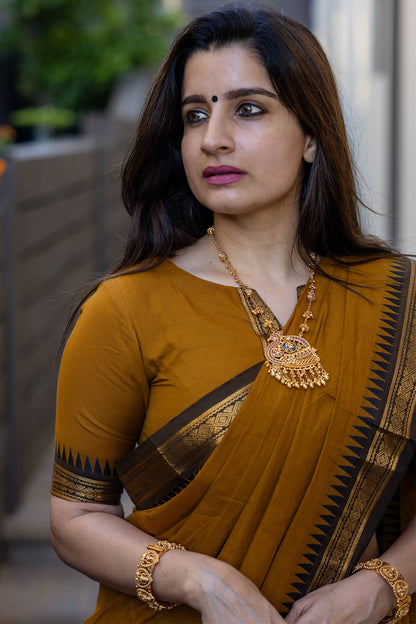 Ephemeral Mustard Cotton Silk Saree With Intricate Blouse Piece