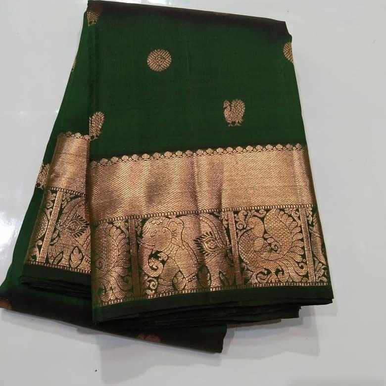 Desirable Dark Green Soft Silk Saree With Beautiful Blouse Piece