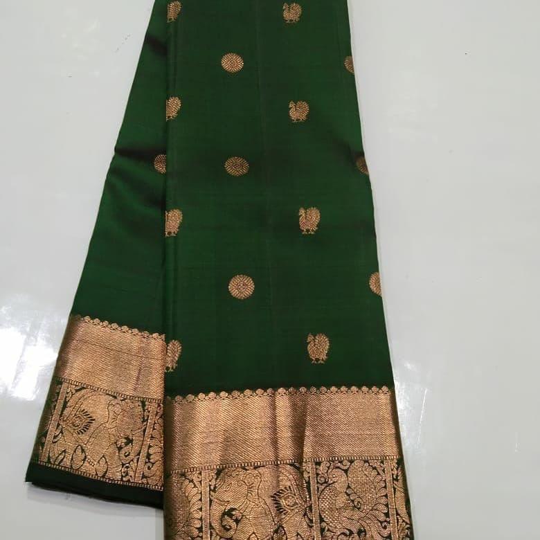 Desirable Dark Green Soft Silk Saree With Beautiful Blouse Piece