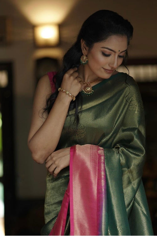 Load image into Gallery viewer, Enchanting Dark Green Soft Silk Saree With Fantabulous Blouse Piece
