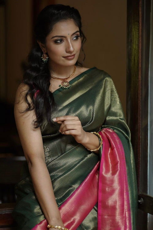 Load image into Gallery viewer, Enchanting Dark Green Soft Silk Saree With Fantabulous Blouse Piece
