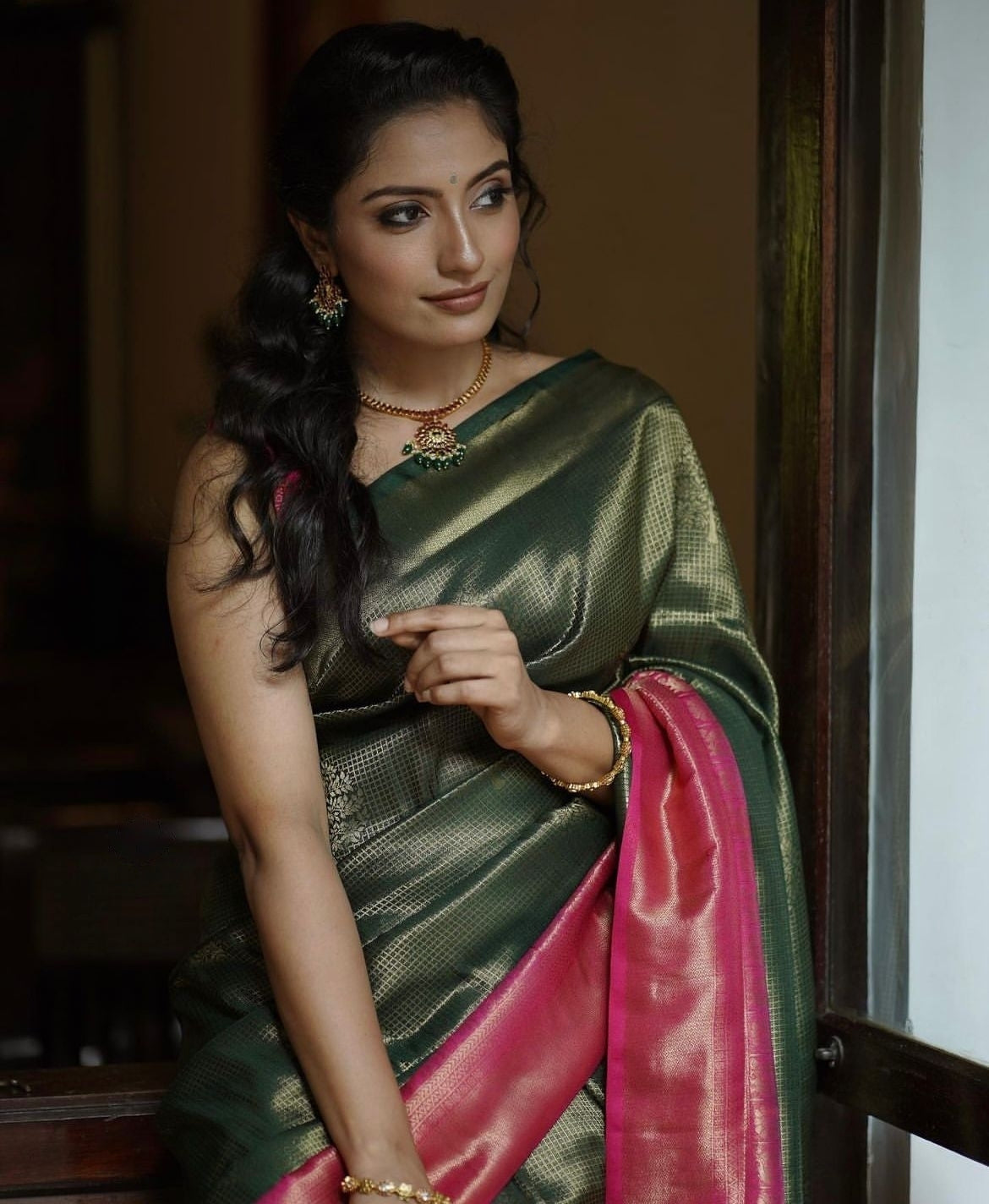 Enchanting Dark Green Soft Silk Saree With Fantabulous Blouse Piece