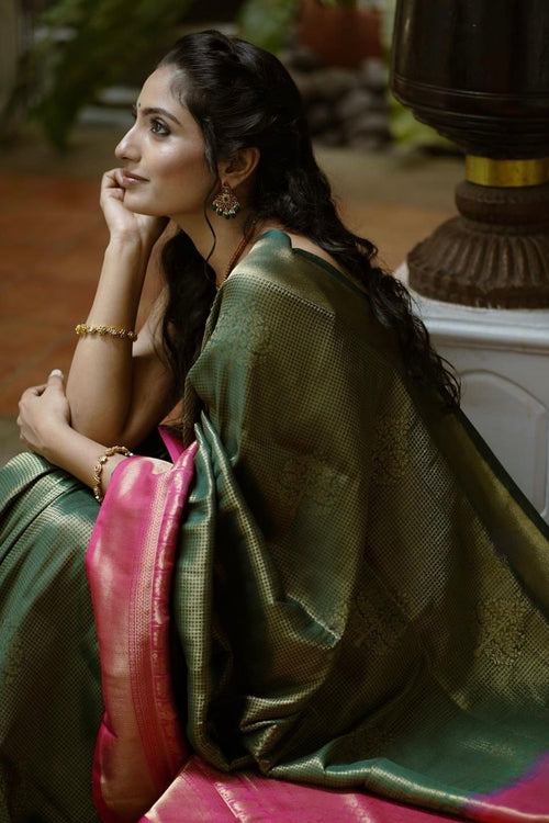 Load image into Gallery viewer, Enchanting Dark Green Soft Silk Saree With Fantabulous Blouse Piece
