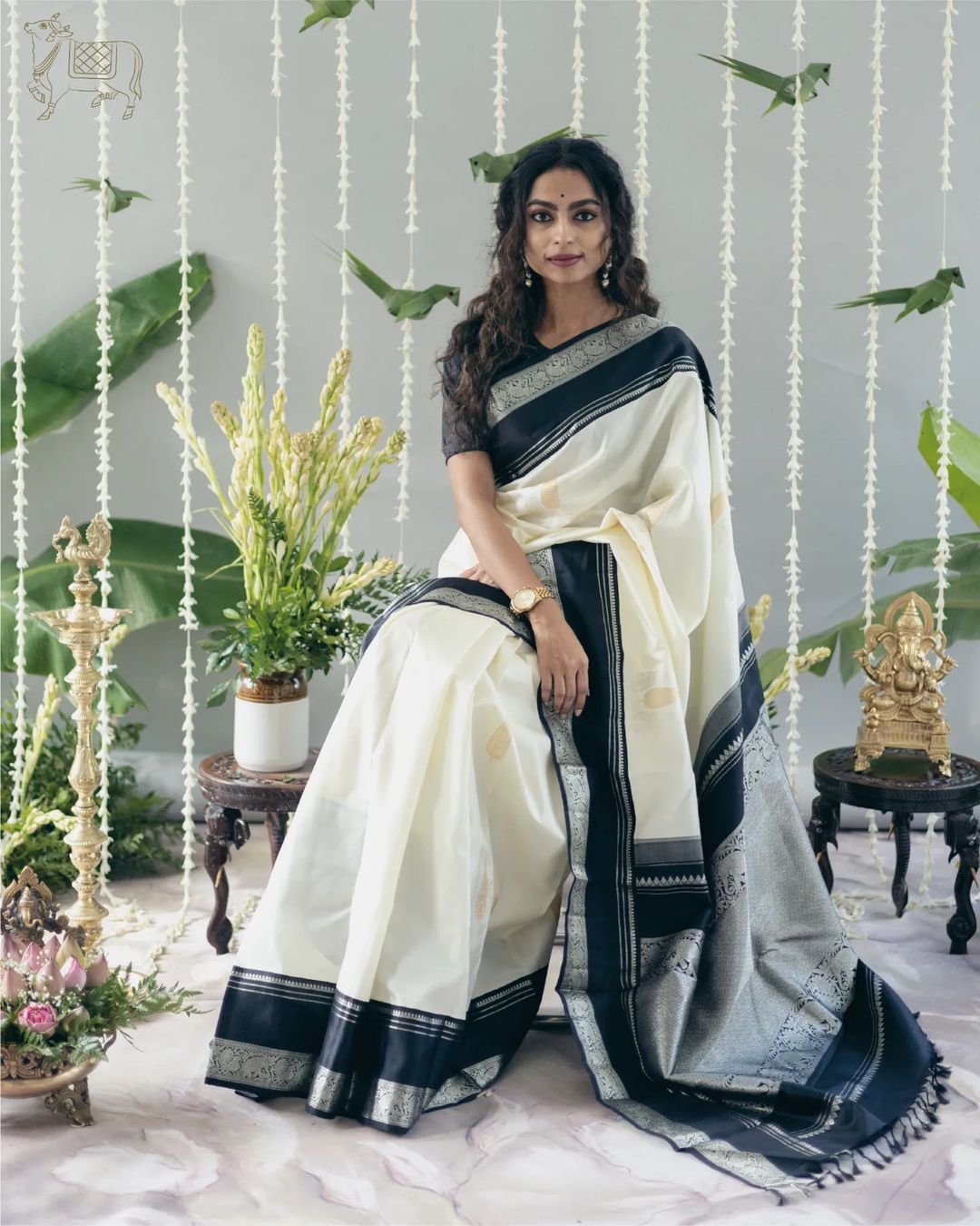 Adorable Off White Soft Silk Saree With Flameboyant Blouse Piece