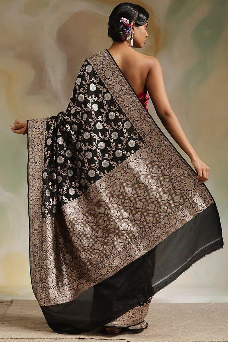 Flaunt Black Soft Silk Saree With Radiant Blouse Piece