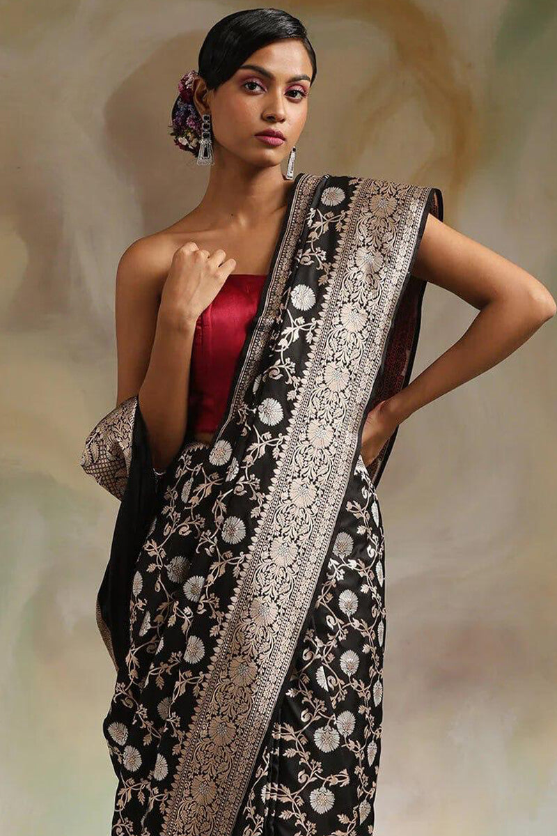 Flaunt Black Soft Silk Saree With Radiant Blouse Piece