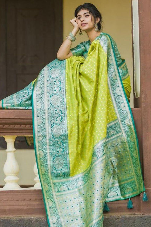 Load image into Gallery viewer, Gratifying Parrot Soft Silk Saree With Elegant Blouse Piece
