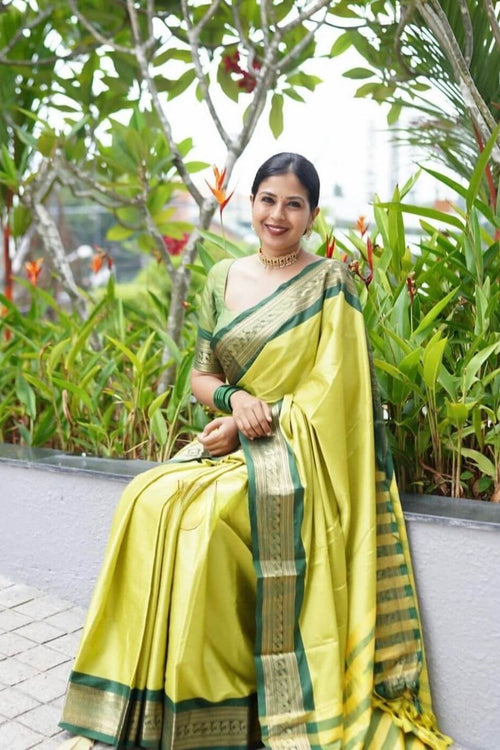 Load image into Gallery viewer, Evanescent Perrot Soft Silk Saree With Chatoyant Blouse Piece
