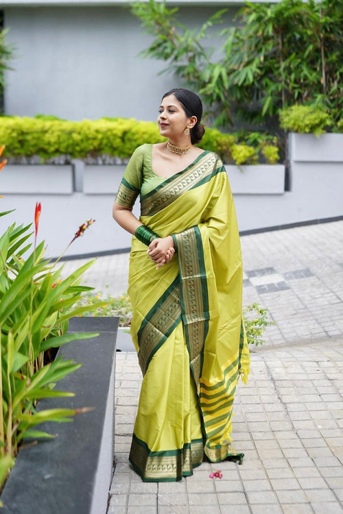 Load image into Gallery viewer, Evanescent Perrot Soft Silk Saree With Chatoyant Blouse Piece
