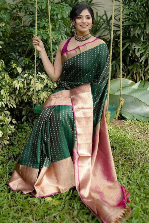 Load image into Gallery viewer, Capricious Dark Green Soft Silk Saree With Lovely Blouse Piece
