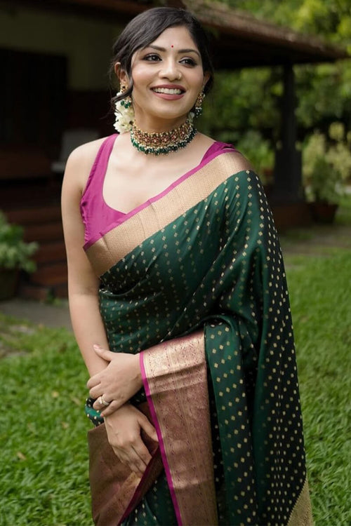 Load image into Gallery viewer, Capricious Dark Green Soft Silk Saree With Lovely Blouse Piece
