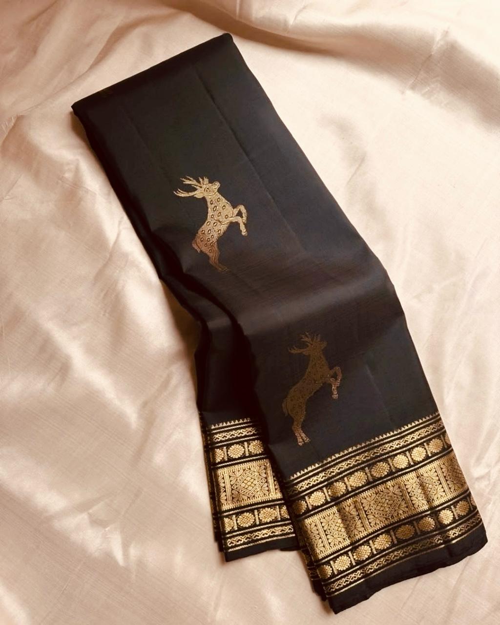Petrichor Black Soft Banarasi Silk Saree With Delectable Blouse Piece