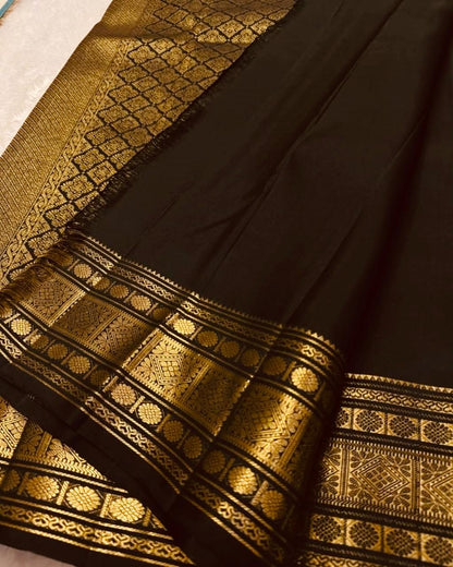 Petrichor Black Soft Banarasi Silk Saree With Delectable Blouse Piece