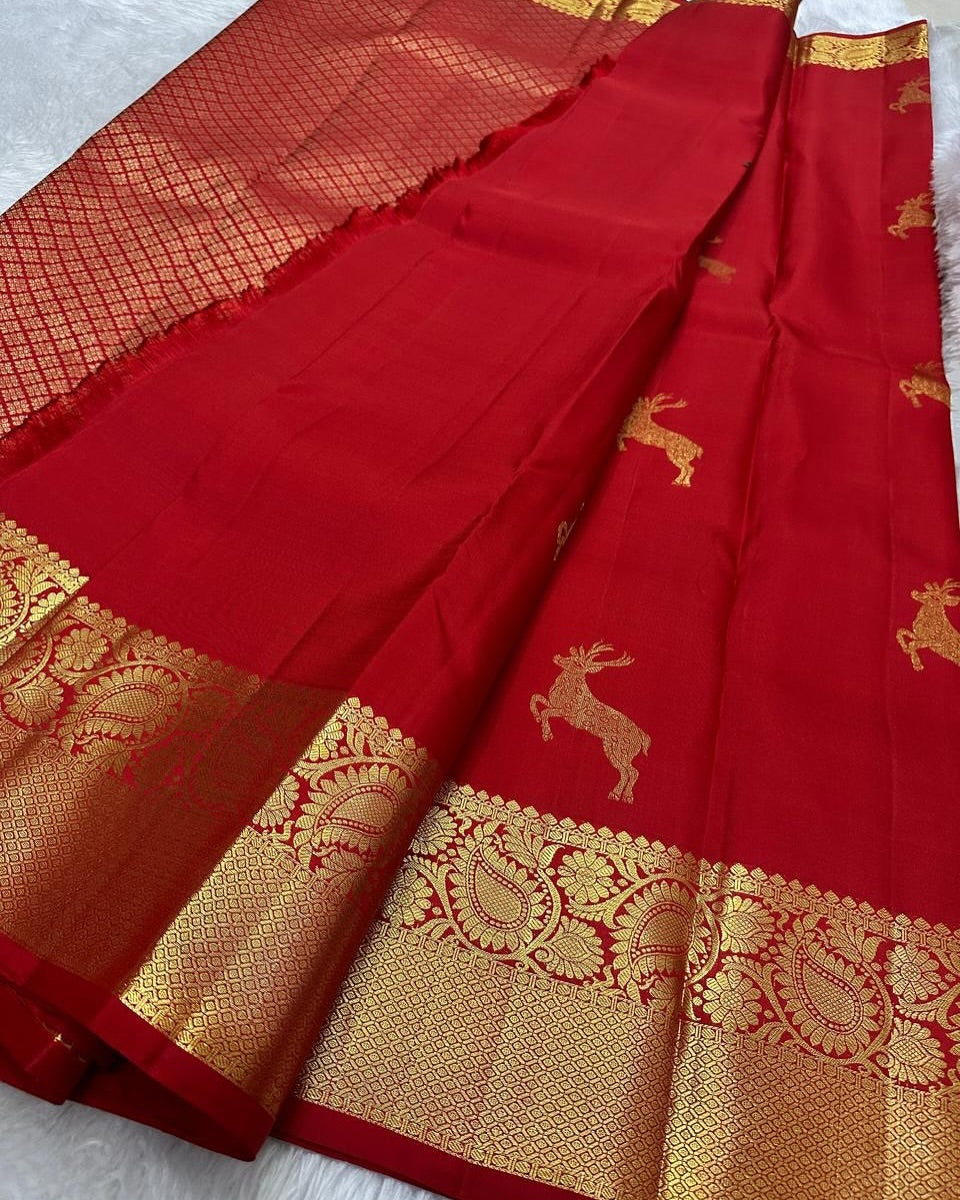 Assemblage Red Soft Banarasi Silk Saree With Delightful Blouse Piece