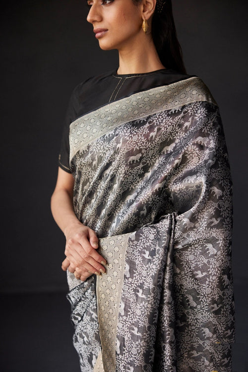 Load image into Gallery viewer, Adorning Black Soft Silk Saree With Prettiest Blouse Piece
