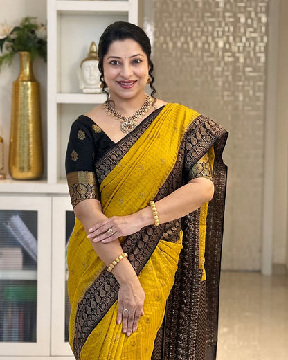 Seraphic Yellow Soft Silk Saree With Susurrous Blouse Piece