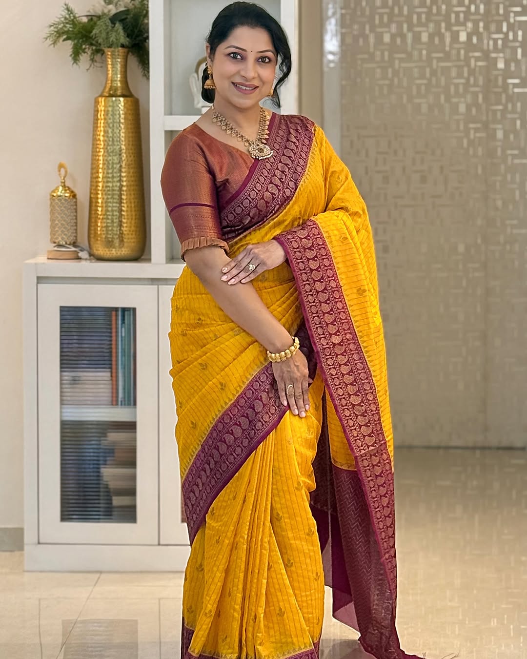 Adorning Yellow Soft Silk Saree With Unique Blouse Piece