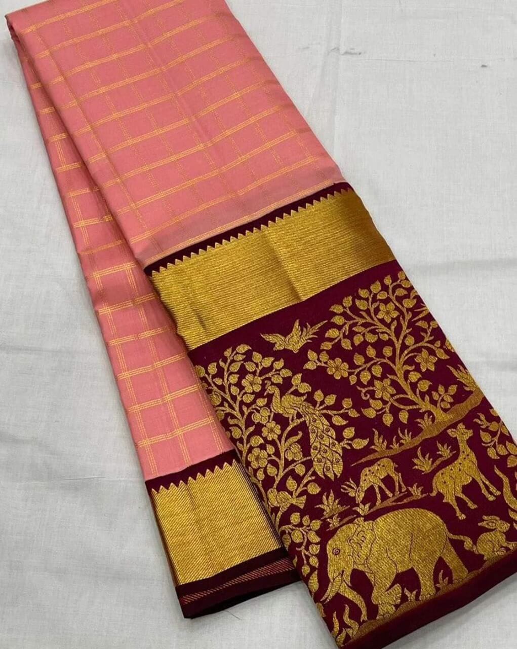 Cynosure Pink Soft Silk Saree With Dazzling Blouse Piece
