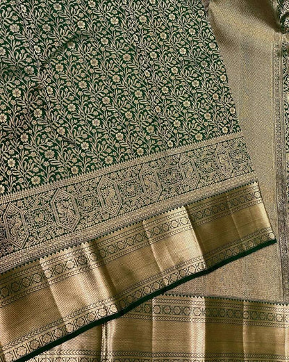 Eloquence Dark Green Soft Banarasi Silk Saree With Engrossing Blouse Piece
