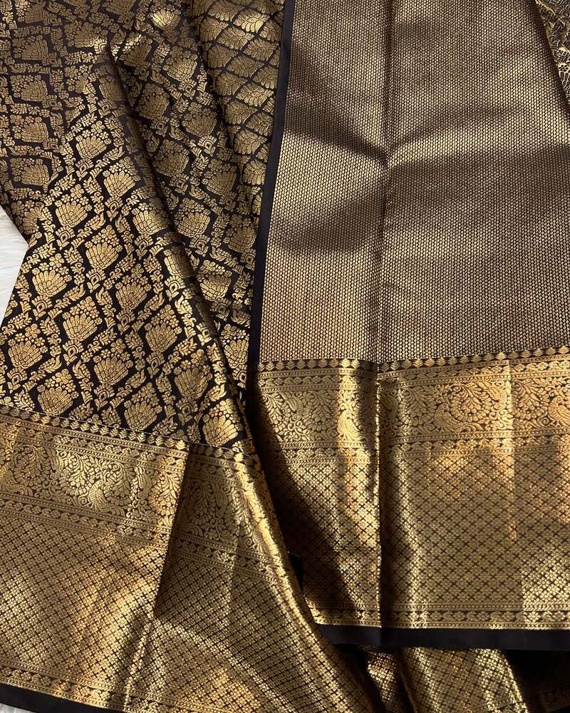 Sizzling Black Soft Banarasi Silk Saree With Alluring Blouse Piece