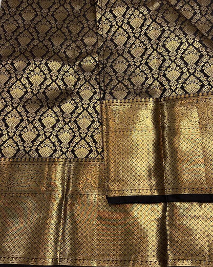 Sizzling Black Soft Banarasi Silk Saree With Alluring Blouse Piece