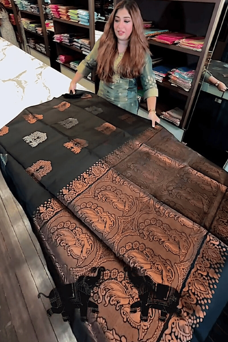 Gratifying Black Soft Banarasi Silk Saree With Intricate Blouse Piece