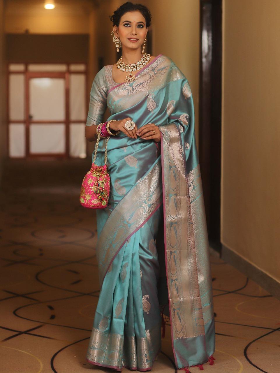 Scintillating Firozi Soft Banarasi Silk Saree With Preferable Blouse Piece