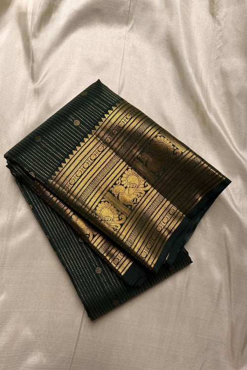 Load image into Gallery viewer, Ephemeral Dark Green Soft Banarasi Silk Saree With Amiable Blouse Piece
