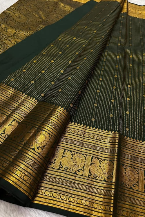 Load image into Gallery viewer, Ephemeral Dark Green Soft Banarasi Silk Saree With Amiable Blouse Piece
