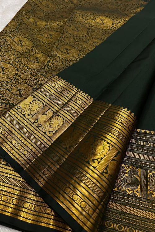Load image into Gallery viewer, Ephemeral Dark Green Soft Banarasi Silk Saree With Amiable Blouse Piece
