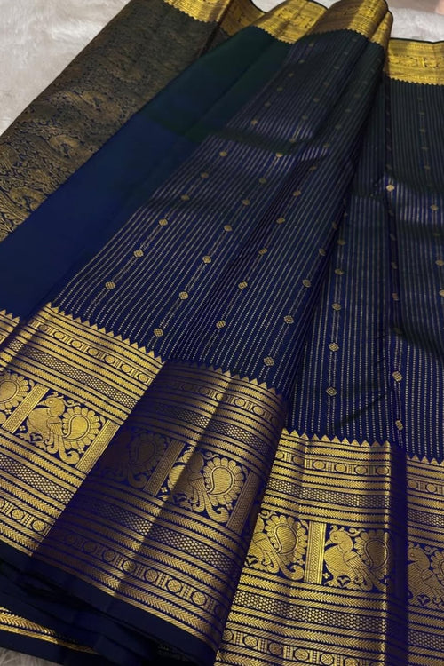 Load image into Gallery viewer, Engrossing Navy Blue Soft Banarasi Silk Saree With Gratifying Blouse Piece
