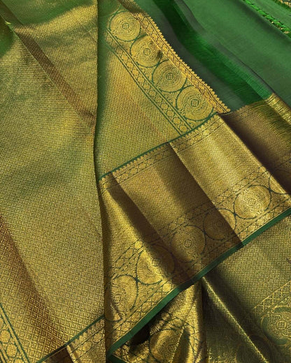 Divine Dark Green Soft Banarasi Silk Saree With Entrancing Blouse Piece