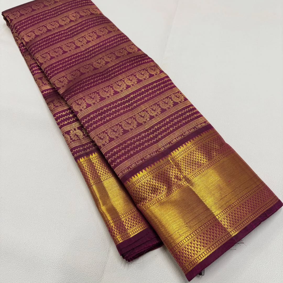 Dazzling Purple Soft Banarasi Silk Saree With Serendipity Blouse Piece