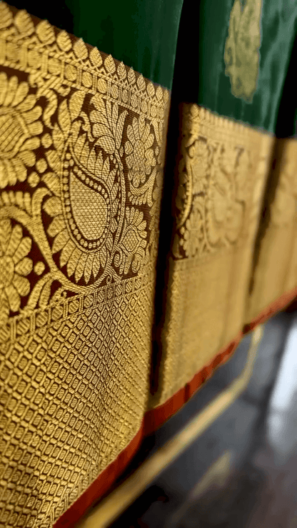 Impressive Dark Green Soft Banarasi Silk Saree With Lovely Blouse Piece