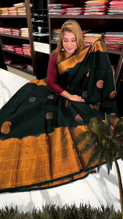 Desuetude Dark Green Soft Banarasi Silk Saree With Gorgeous Blouse Piece