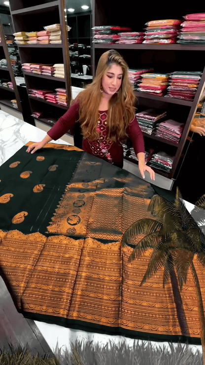 Desuetude Dark Green Soft Banarasi Silk Saree With Gorgeous Blouse Piece