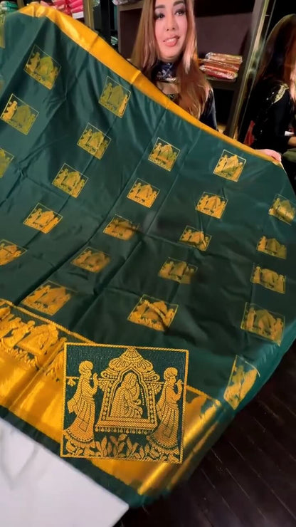 Angelic Dark Green Soft Banarasi Silk Saree With Deserving Blouse Piece