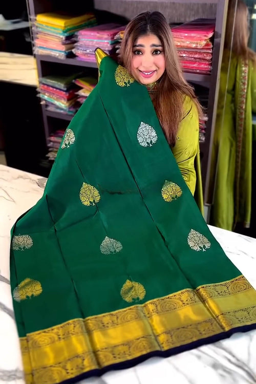 Load image into Gallery viewer, Eloquence Dark Green Soft Banarasi Silk Saree With Ineffable Blouse Piece
