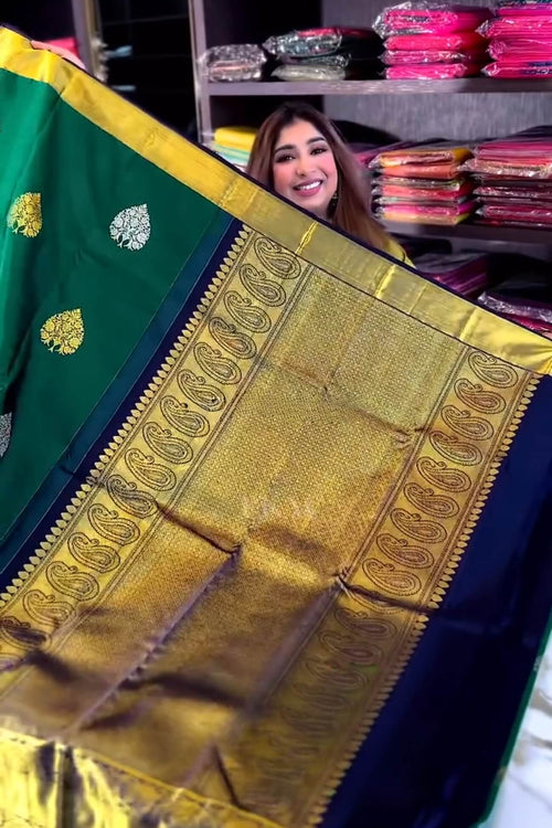 Load image into Gallery viewer, Eloquence Dark Green Soft Banarasi Silk Saree With Ineffable Blouse Piece
