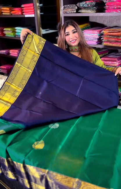 Eloquence Dark Green Soft Banarasi Silk Saree With Ineffable Blouse Piece