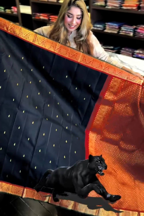 Load image into Gallery viewer, Magnificat Black Soft Banarasi Silk Saree With Confounding  Blouse Piece
