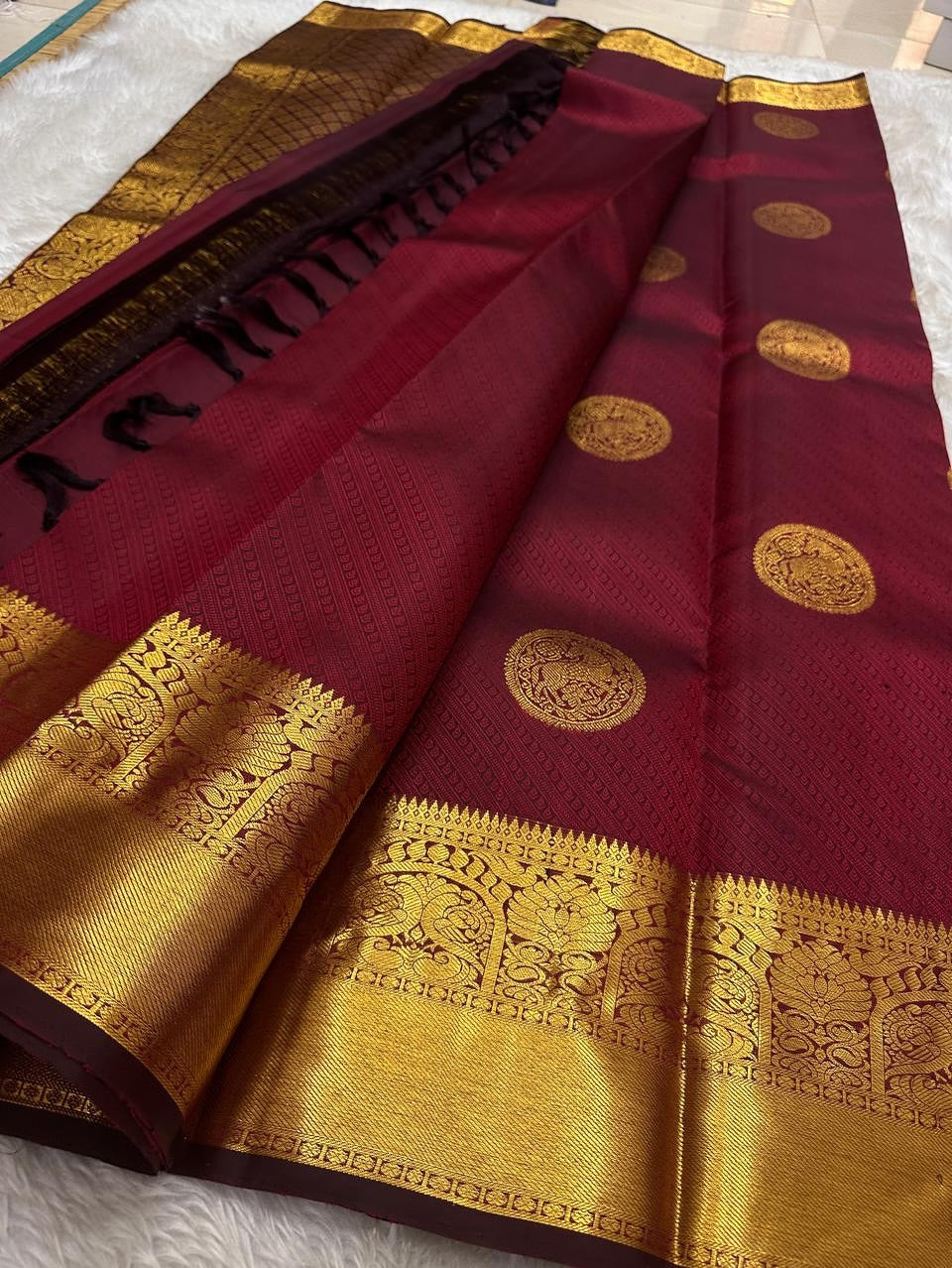 Embellished Maroon Soft Banarasi Silk Saree With Gossamer Blouse Piece