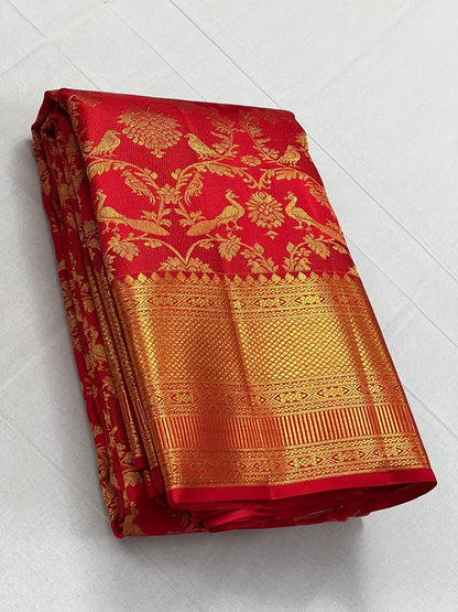 Cynosure Red Soft Banarasi Silk Saree With Desultory Blouse Piece
