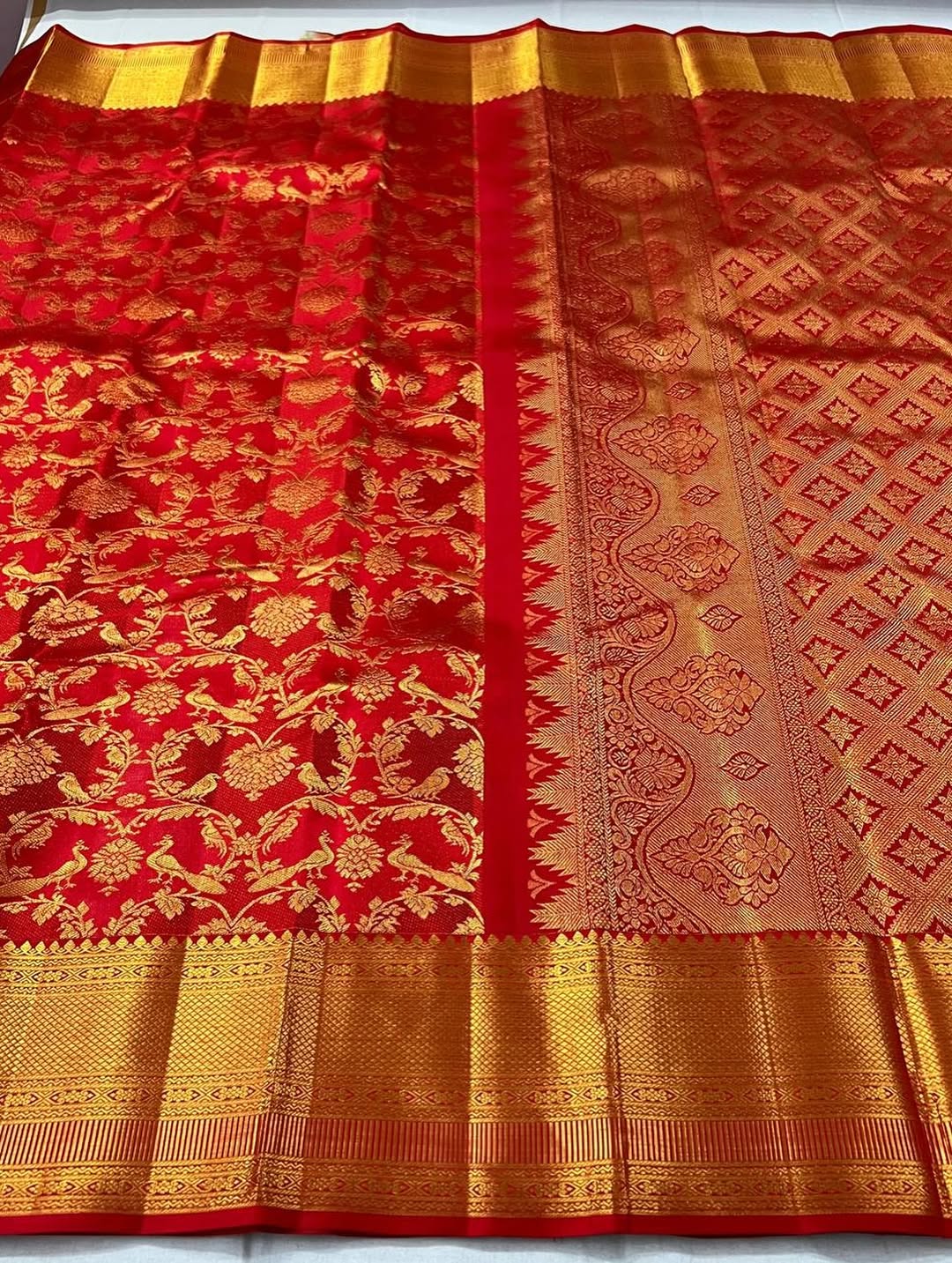Cynosure Red Soft Banarasi Silk Saree With Desultory Blouse Piece